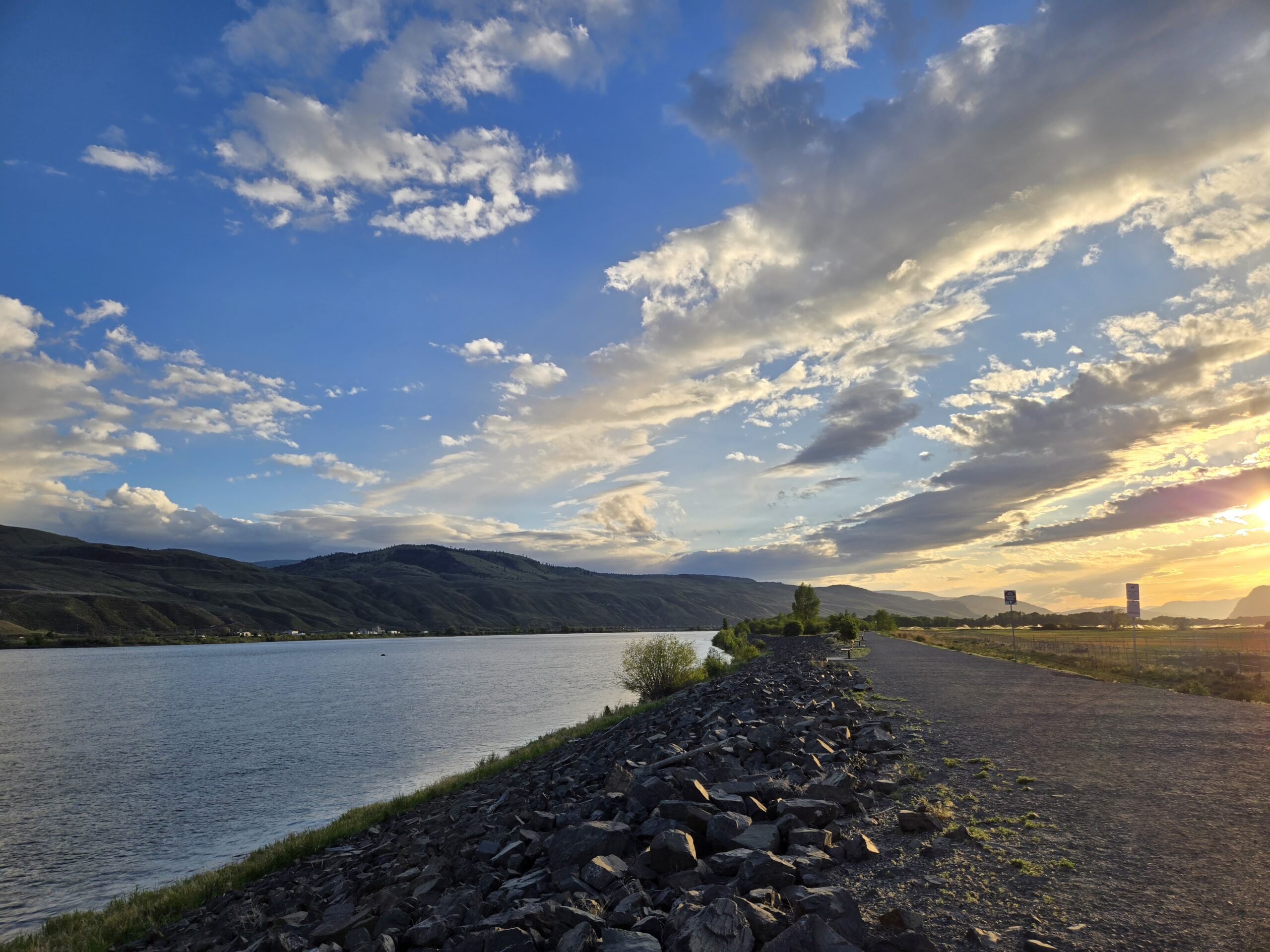 A riverbank at sunset